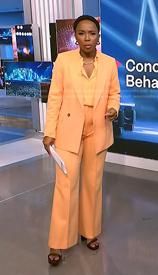 Zinhle’s orange blazer and wide leg pants on NBC News Daily