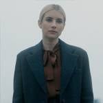 Anna’s brown tie-neck blouse and oversized blazer on American Horror Story Delicate