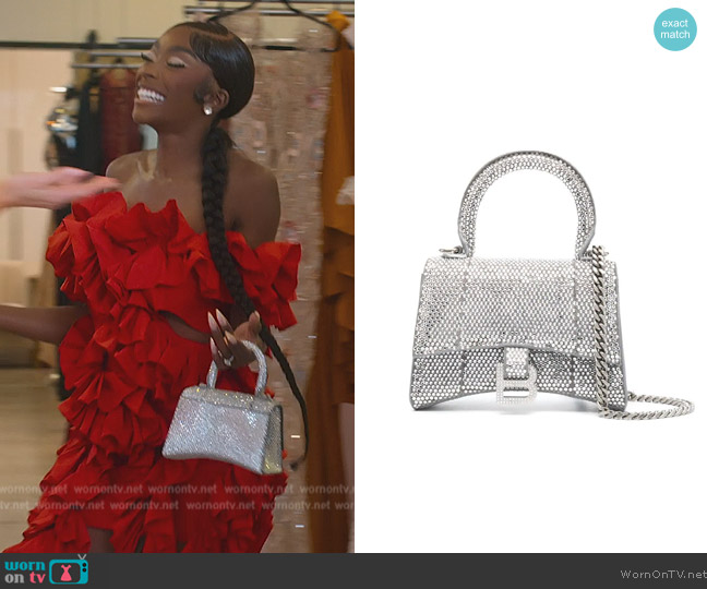 Balenciaga Hourglass crystal-embellished mini bag worn by (Chelsea Lazkani) on Selling the OC
