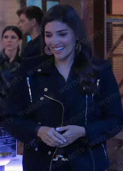 Brook Lynn’s black biker jacket and gold hoop earrings on General Hospital
