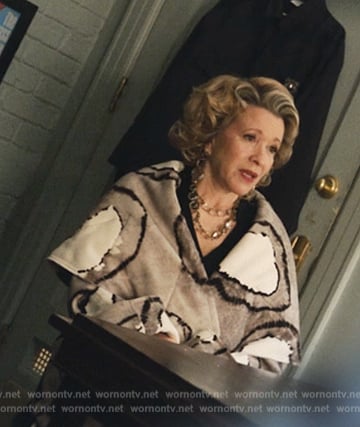 Donna’s gray and white wrap coat on Only Murders in the Building