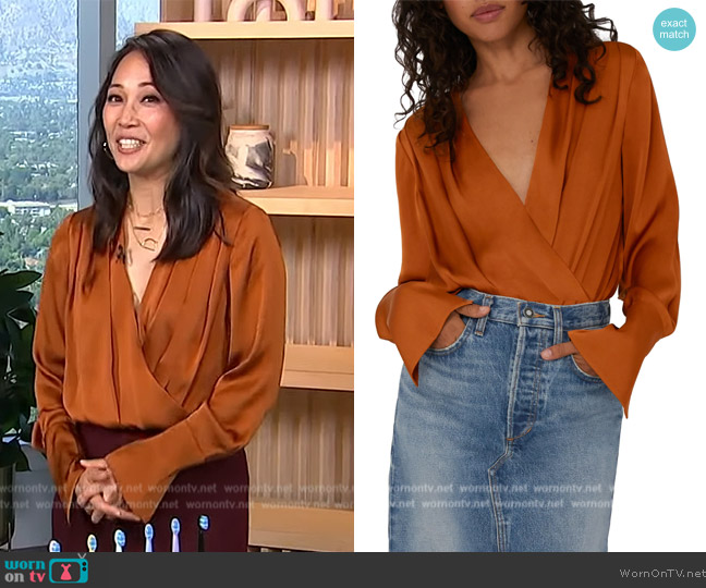 Favorite Daughter Surplice Long Sleeve Satin Bodysuit worn by Diane Mizota on Access Hollywood