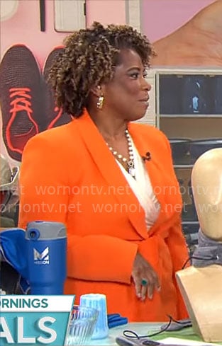 Gayle Bass’ orange tie waist blazer on CBS Mornings