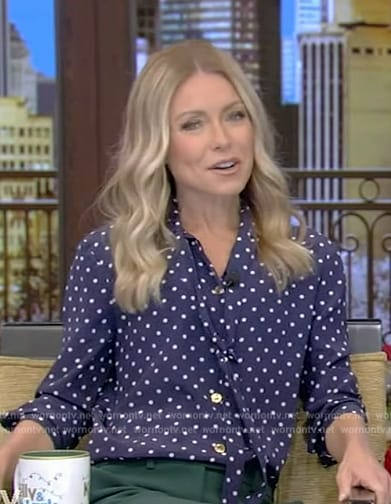 Kelly’s blue polka dot tie neck blouse on Live with Kelly and Mark
