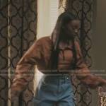 Kiesha’s brown half zip nylon top and cargo jeans on The Chi
