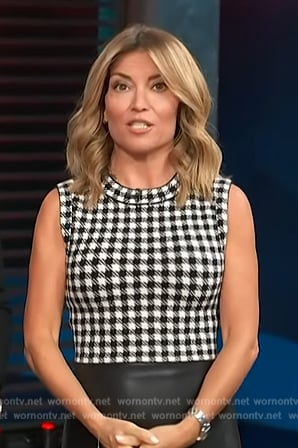 Kit’s houndstooth knit vest on Access Hollywood