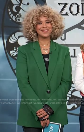 Lauren Messiah’s green blazer on Access Hollywood