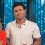 Mario’s beige polo shirt on Access Hollywood