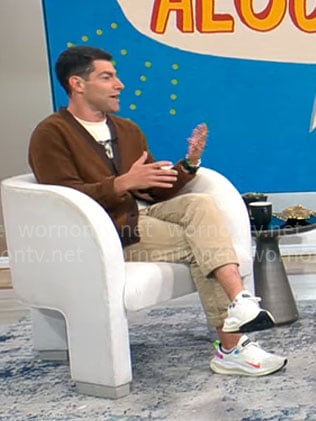 Max Greenfield’s brown cardigan and Nike sneakers on CBS Mornings