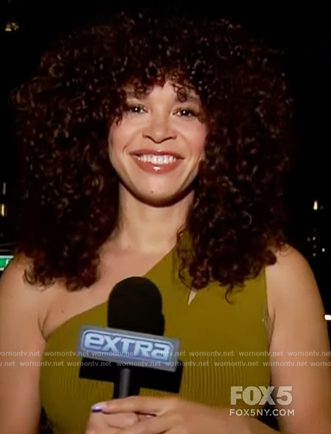 Megan Ryte’s green one shoulder dress on Extra