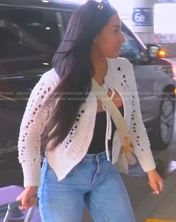 Monica’s white open knit cardigan on The Real Housewives of Salt Lake City