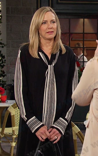 Nicole’s black striped tie neck dress on Days of our Lives