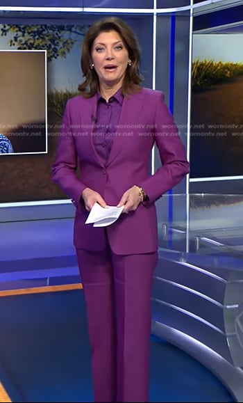 Norah’s purple tie neck blouse and suit on CBS Evening News