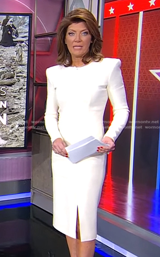 Norah’s white long sleeve sheath dress on CBS Evening News