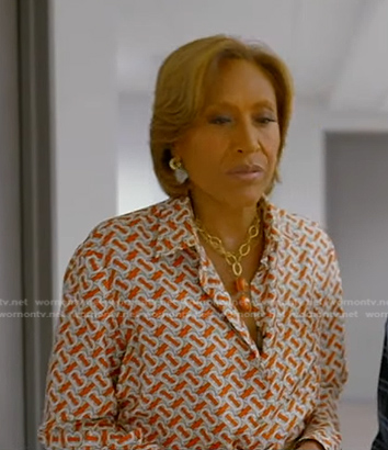 Robin’s orange and white print blouse on Good Morning America