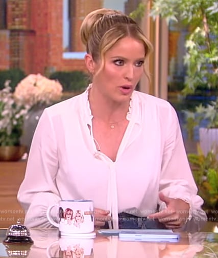 Sara’s white tie neck blouse and denim skirt on The View