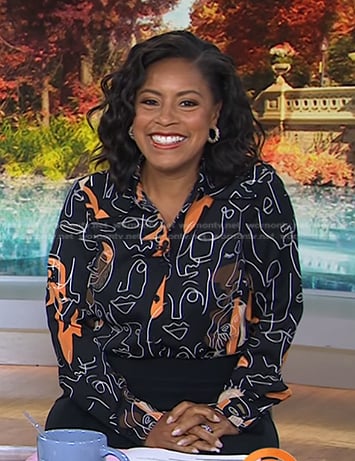 Sheinelle’s black face print blouse on Today