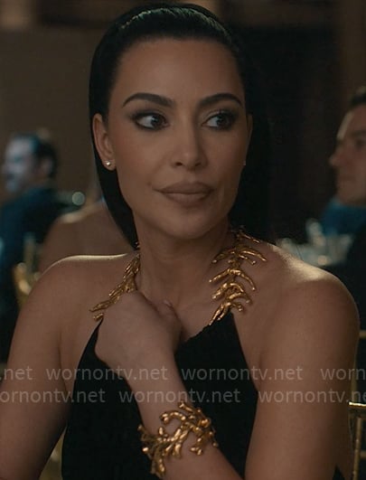 Siobhan’s halter gown with gold detail on American Horror Story Delicate
