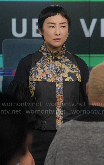 Stella’s black floral inset print top on The Morning Show