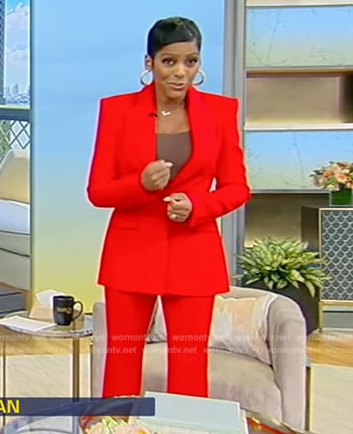 Tamron’s red blazer and pants on Tamron Hall Show