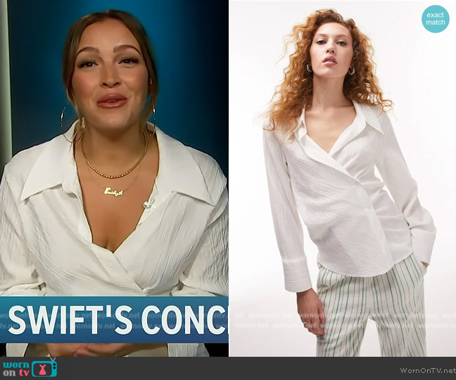 Topshop Textured Wrap Blouse worn by Emily Orozco on Access Hollywood