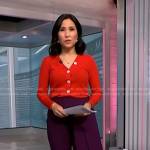 Vicky’s red cardigan and purple draped side pants on NBC News Daily