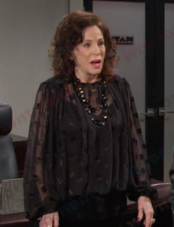 Vivian’s black sheer blouse on Days of our Lives