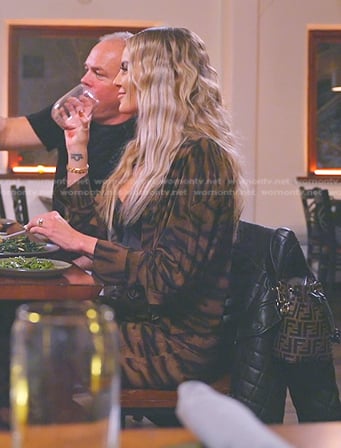 Whitney’s tiger print shirt and slit pants on The Real Housewives of Salt Lake City