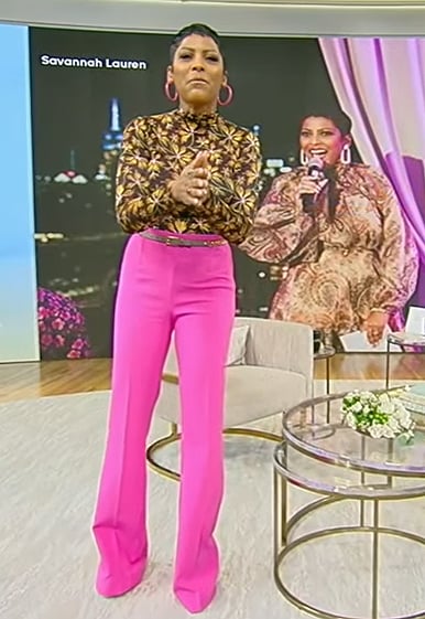 Tamron’s black floral print mesh top on Tamron Hall Show