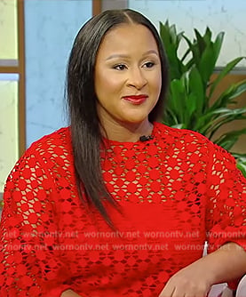 Angela Benton’s red guipure lace top on Tamron Hall Show
