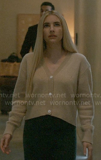 Anna’s camel v-neck cardigan on American Horror Story