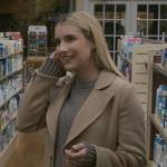 Anna’s long camel coat and taupe sweater on American Horror Story