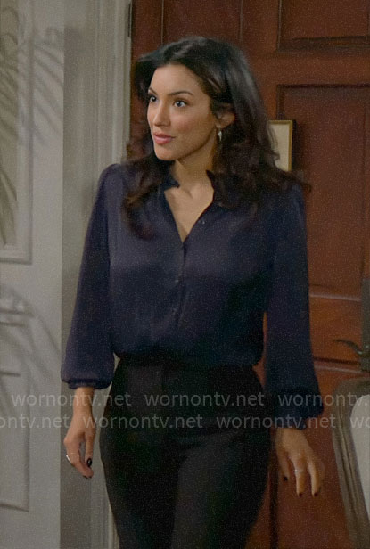 Audra’s navy ruffled button front blouse on The Young and the Restless