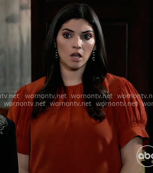 Brook Lynn’s red puff sleeve top on General Hospital