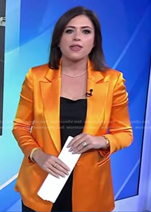Chloe Melas’s orange satin blazer on NBC News Daily
