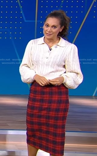 Ginger’s white cable knit sweater and red plaid pencil skirt on Good Morning America