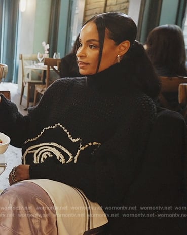Sai’s black floral crochet knit sweater on The Real Housewives of New York City