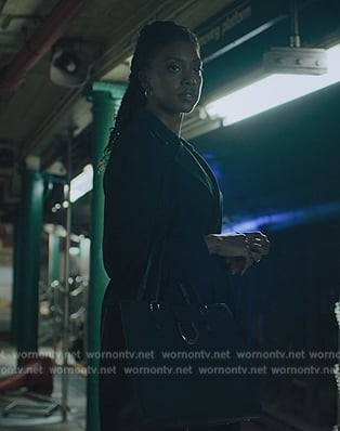 Kate’s black leather bag on Billions