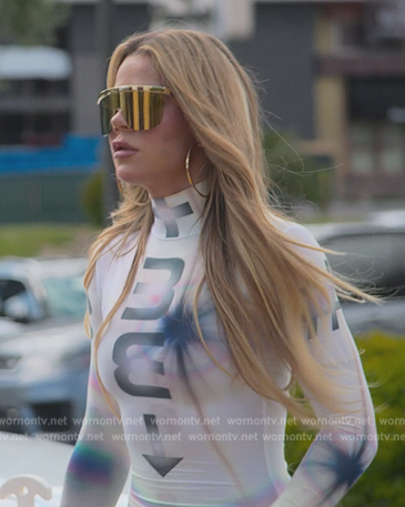 Khloe’s white printed mesh mini dress on The Kardashians