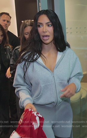 Kim’s light gray hoodie and leggings on The Kardashians