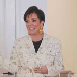 Kris’s printed blazer and earrings on The Kardashians