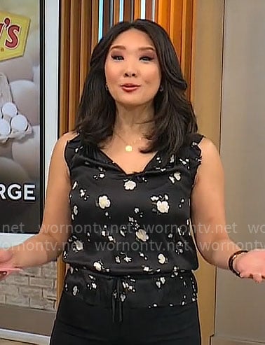 Nancy Chen’s black floral v-neck top on CBS Mornings