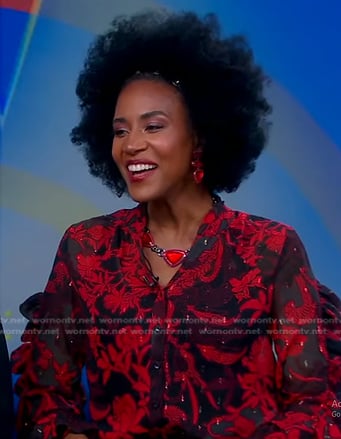 Nikki Russell’s red and black floral ruffle blouse on Good Morning America