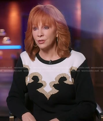 Reba’s black embellished colorblock sweater on The Voice