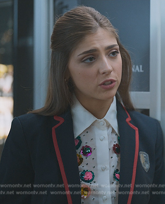 Sara’s white floral sequin embellished blouse on Elite