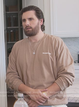 Scott’s khaki sweatshirt on The Kardashians