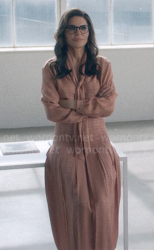 Sheila’s pink tie neck blouse and skirt on American Horror Stories