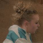 Shelby’s turquoise striped polo shirt on American Horror Stories