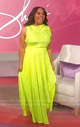 Sherri’s lime green top and asymmetric skirt on Sherri
