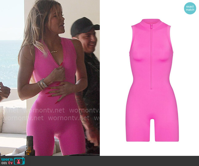 Skims Mock Neck Cycle Suit in Taffy worn by Khloe Kardashian (Khloe Kardashian) on The Kardashians